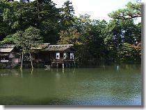 Uchihashi-tei Tea House: This is one of the four tea houses which used to be located in the Renchi-tei garden, today standing at the southwestern edge of Kasumiga-ike pond. It was moved to the current site from the horse riding ground in the Renchi-tei garden in 1874. The house supported by the stone legs with the dense forest of Sazae-yama hill in its background looks as if it is floating on the water.